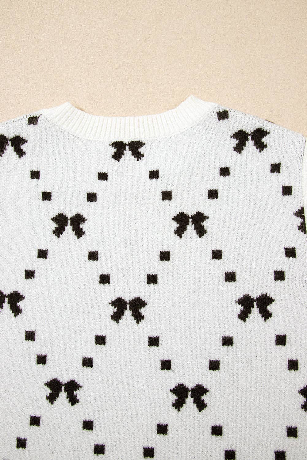 White Bow Pattern Cropped Sweater Vest
